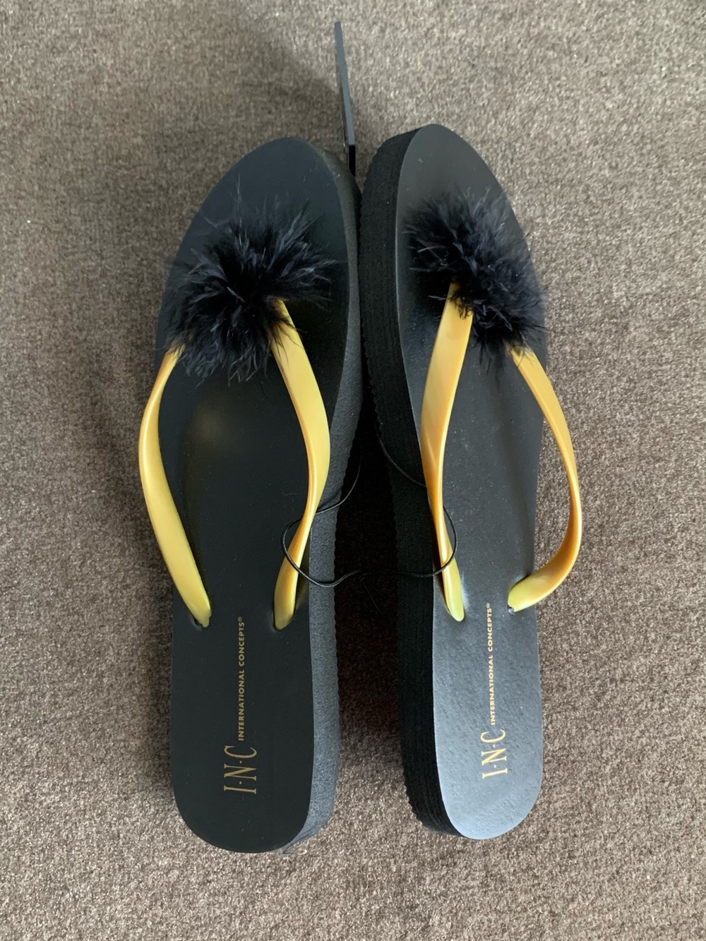 INC International Concepts Black Flip Flops Gold Straps Black Feather Pom 6/7